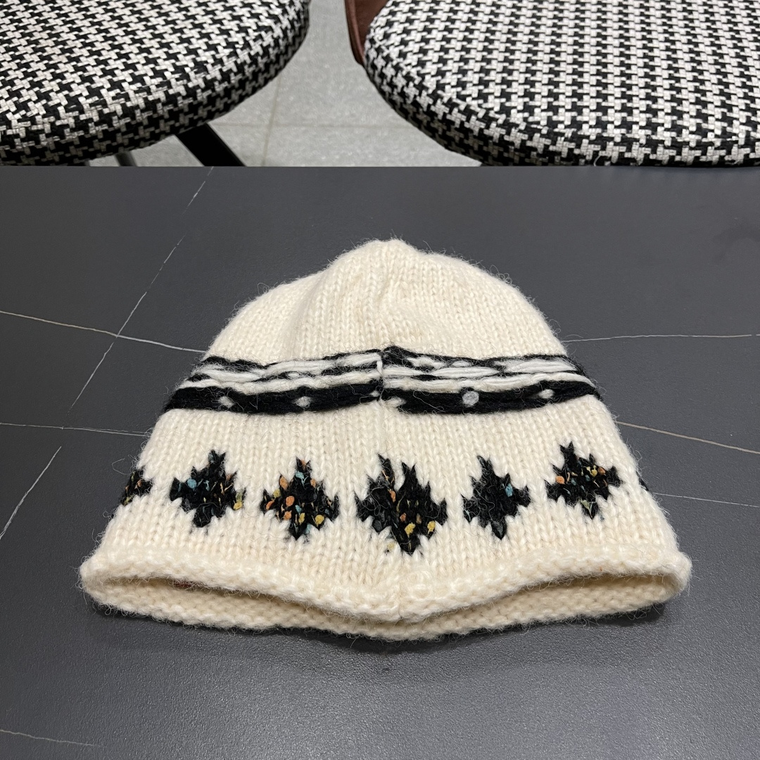  CELINE赛琳 秋冬新款墨调普鲁士蓝包头帽提花自然卷边毛线
帽男女凹造型针织帽