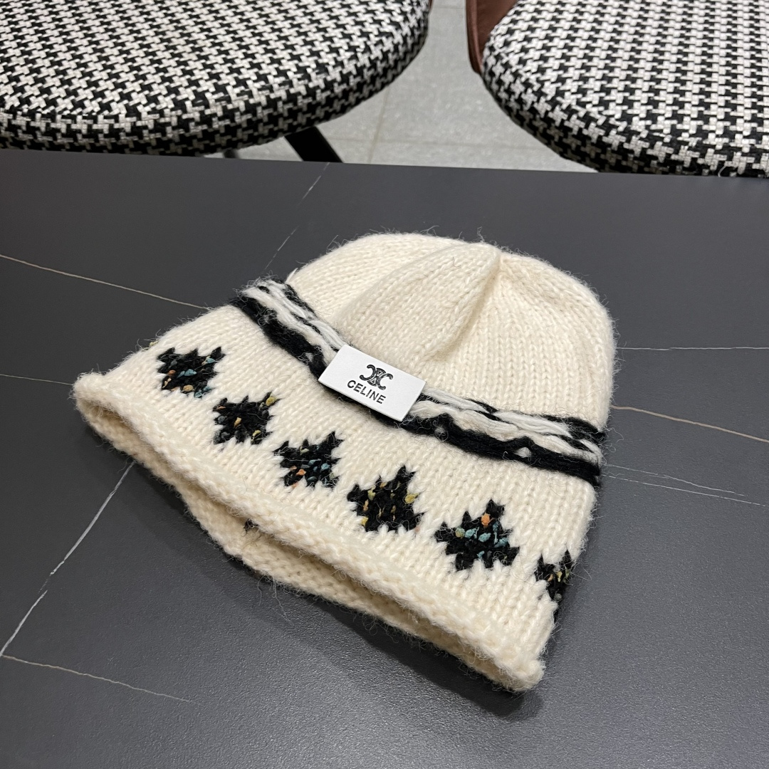  CELINE赛琳 秋冬新款墨调普鲁士蓝包头帽提花自然卷边毛线
帽男女凹造型针织帽