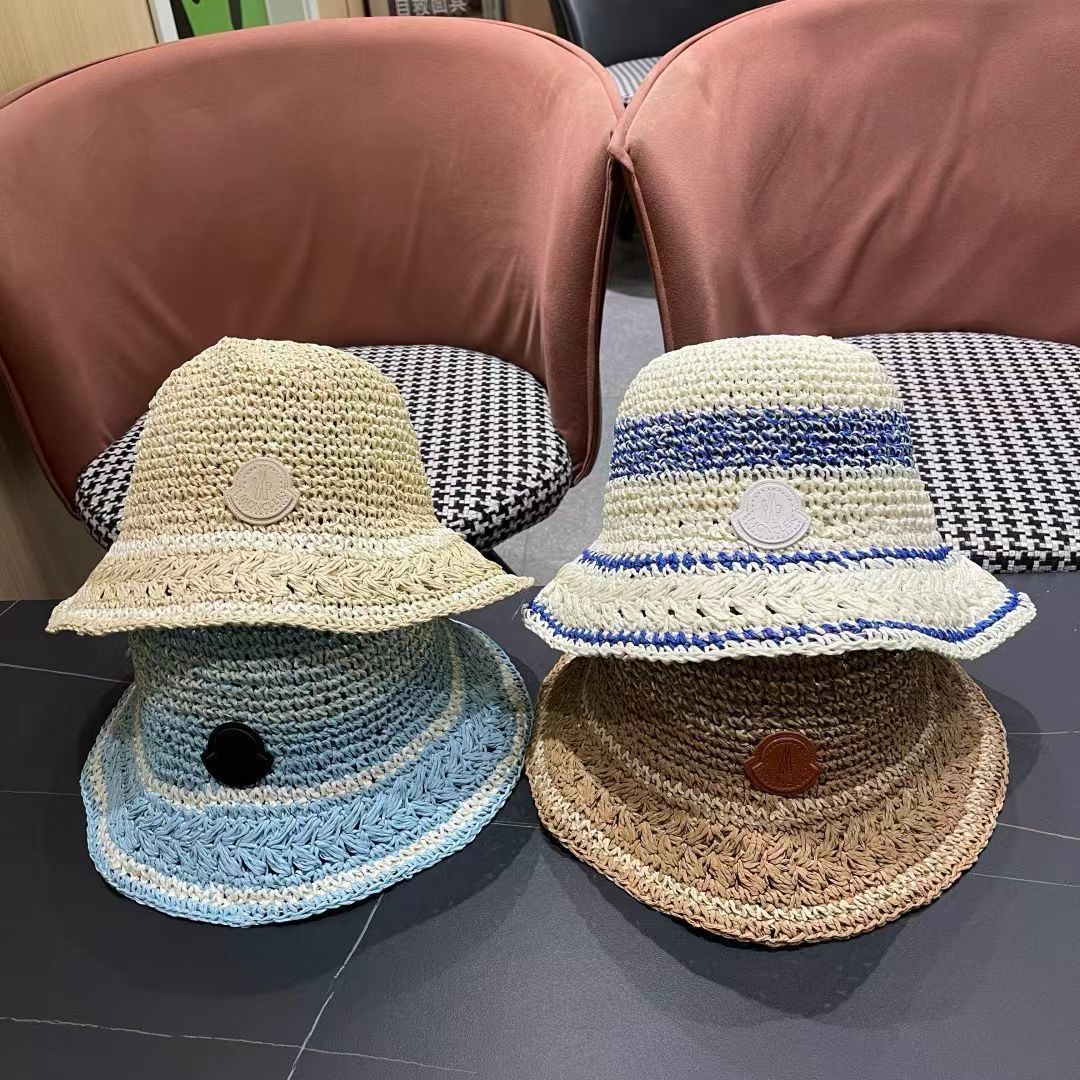  （蒙囗MONCLER海边度假条纹手工编织渔夫帽女夏法式镂空大帽檐遞阳防晒草帽
