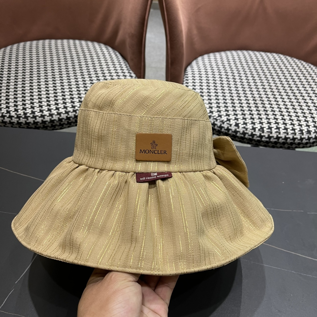  蒙囗MONCLER2025新款帽子纯色彩胶蝴蝶结渔夫帽户外防紫
外线太阳帽夏季遮阳帽