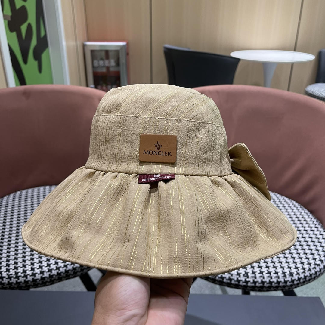  蒙囗MONCLER2025新款帽子纯色彩胶蝴蝶结渔夫帽户外防紫
外线太阳帽夏季遮阳帽
