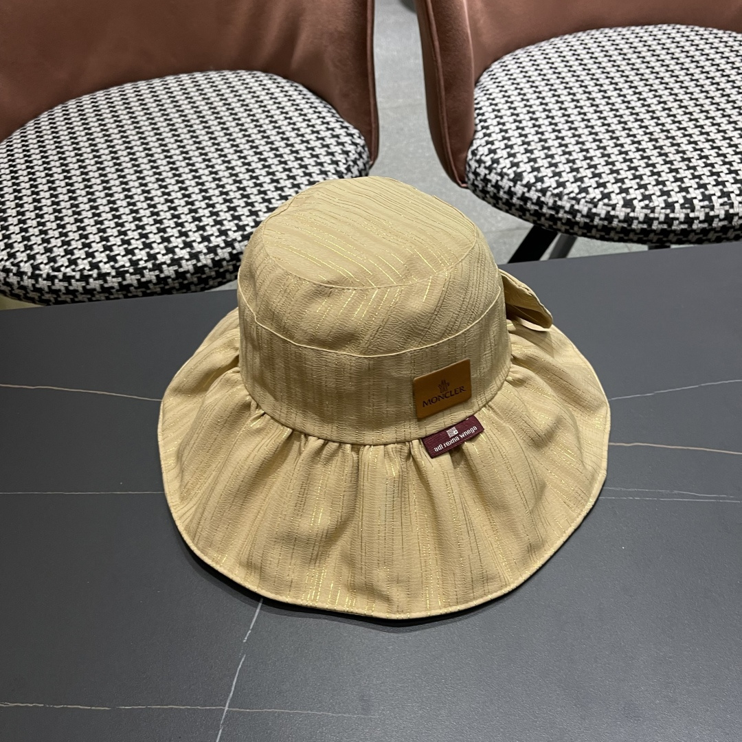  蒙囗MONCLER2025新款帽子纯色彩胶蝴蝶结渔夫帽户外防紫
外线太阳帽夏季遮阳帽