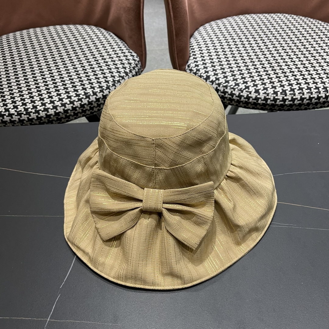  蒙囗MONCLER2025新款帽子纯色彩胶蝴蝶结渔夫帽户外防紫
外线太阳帽夏季遮阳帽