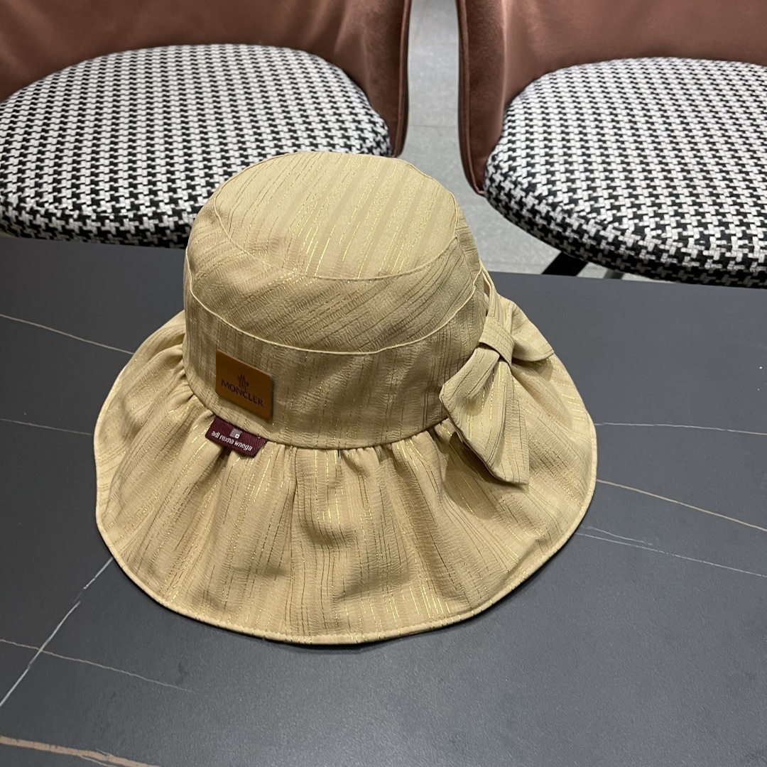  蒙囗MONCLER2025新款帽子纯色彩胶蝴蝶结渔夫帽户外防紫
外线太阳帽夏季遮阳帽