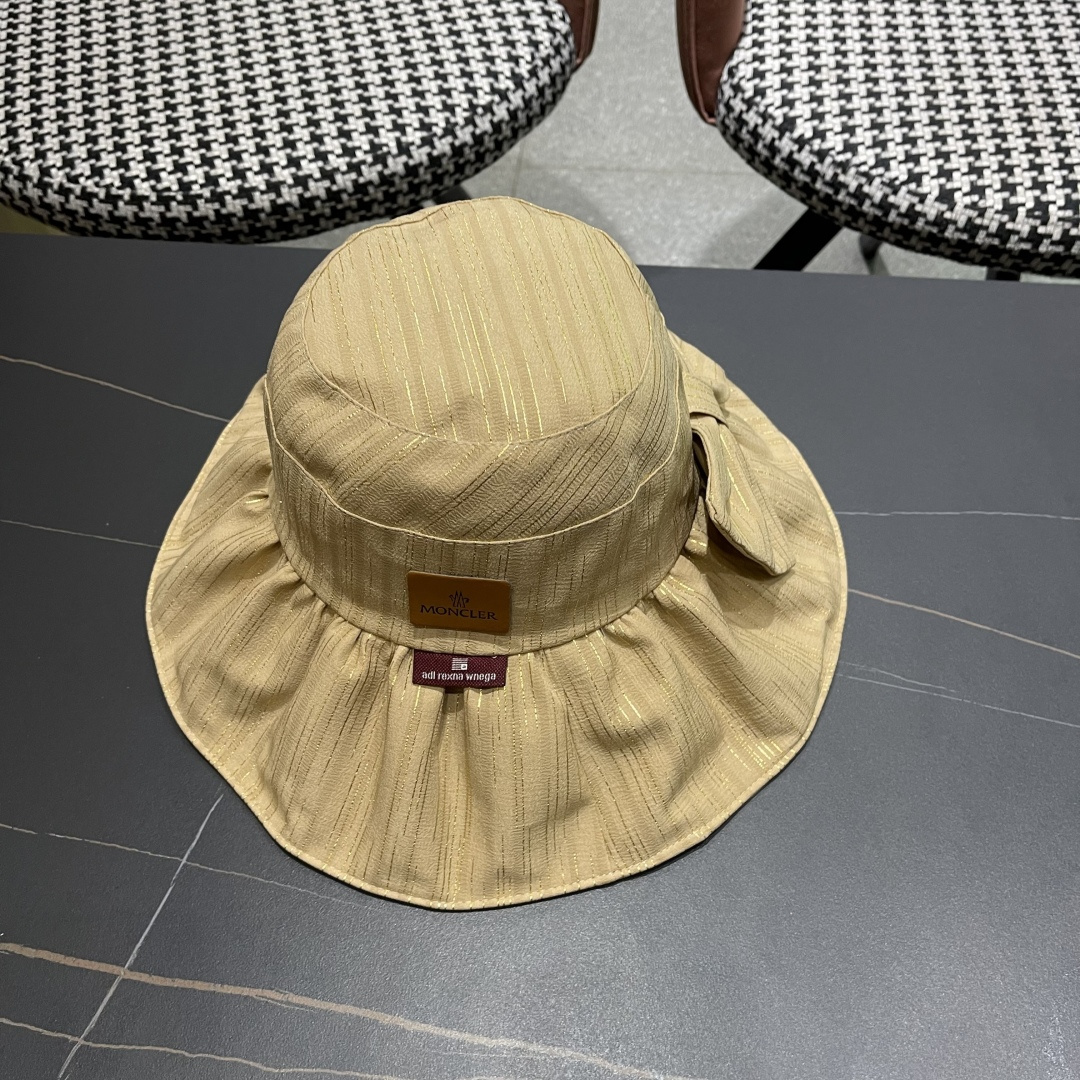  蒙囗MONCLER2025新款帽子纯色彩胶蝴蝶结渔夫帽户外防紫
外线太阳帽夏季遮阳帽