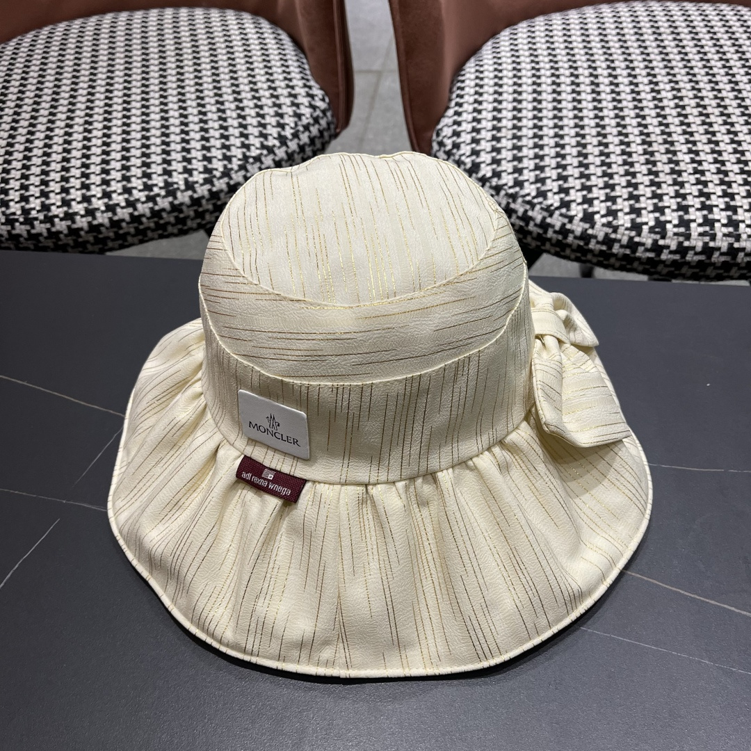  蒙囗MONCLER 2025新款帽子纯色彩胶蝴蝶结渔夫帽户外防紫
外线太阳帽夏季遮阳帽