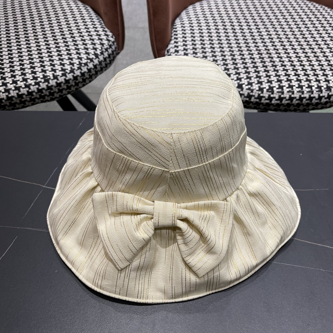  蒙囗MONCLER 2025新款帽子纯色彩胶蝴蝶结渔夫帽户外防紫
外线太阳帽夏季遮阳帽