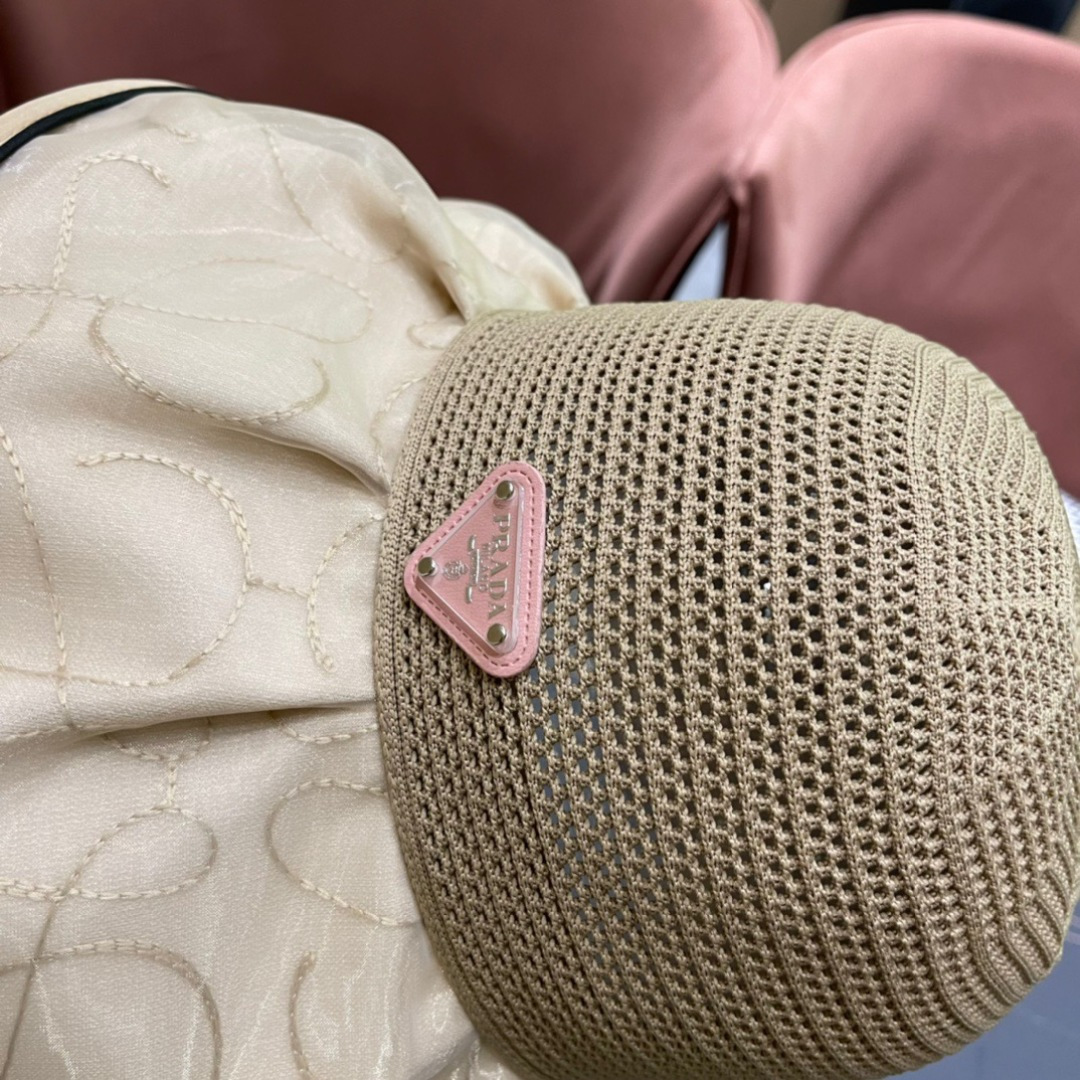  普拉达Prada2025流行新款韩版甜美可爱系带蝴蝶结渔夫帽子女遮阳防晒盆帽