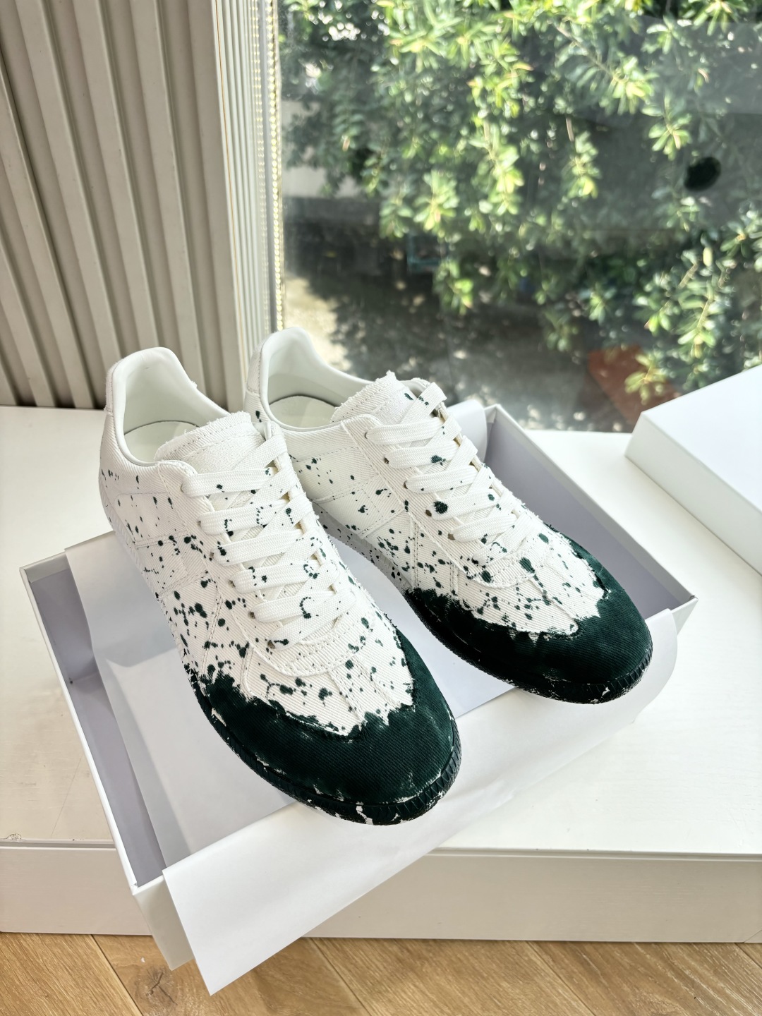 Maison Margiela MM6 German Training Shoe: Luxurious T-shaped Leather Design.