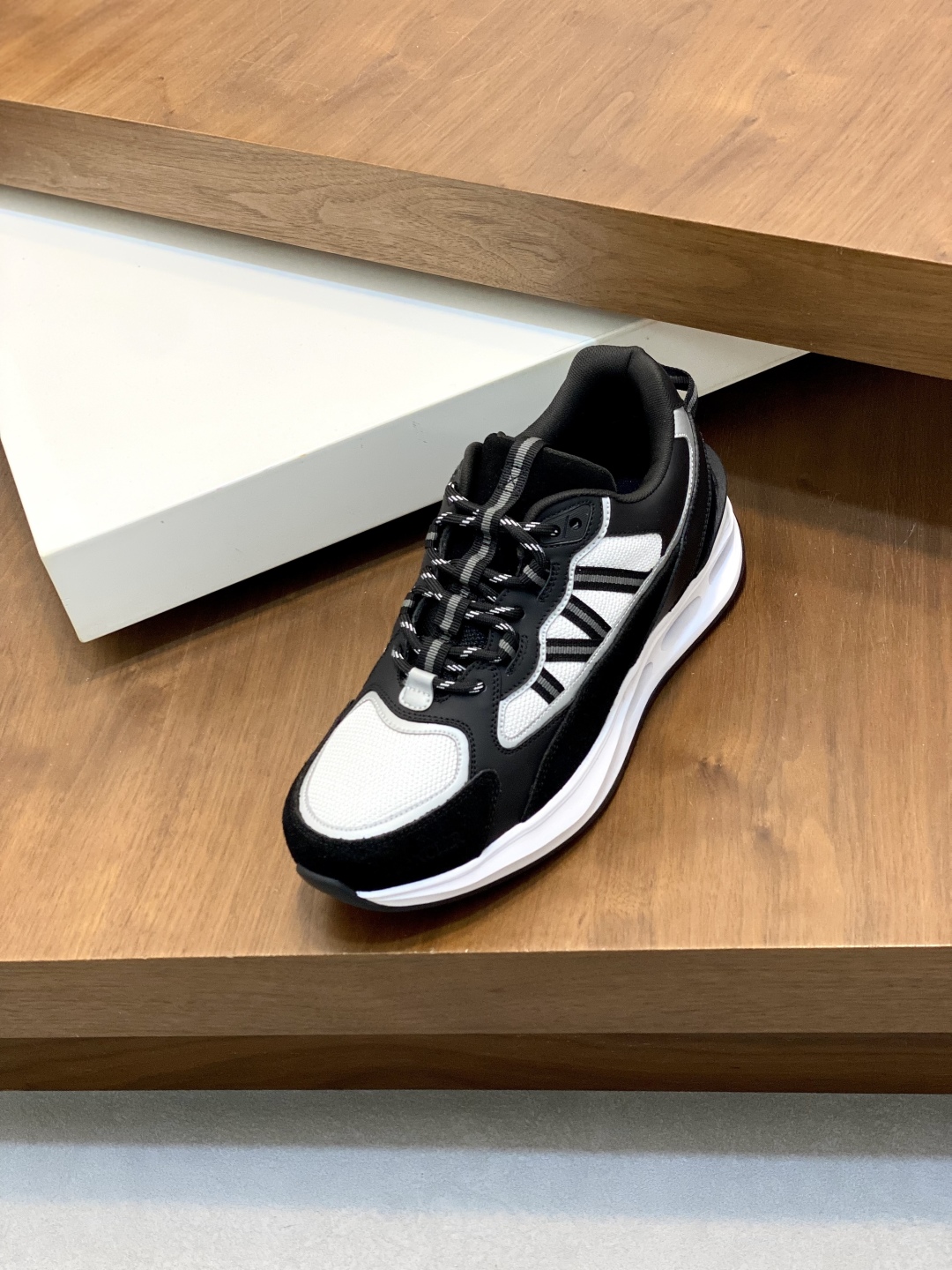 Moncler Men's Leather Sneakers with Rubber Detailing in Black and White 7 cmp i1744042353948 9979 0 5