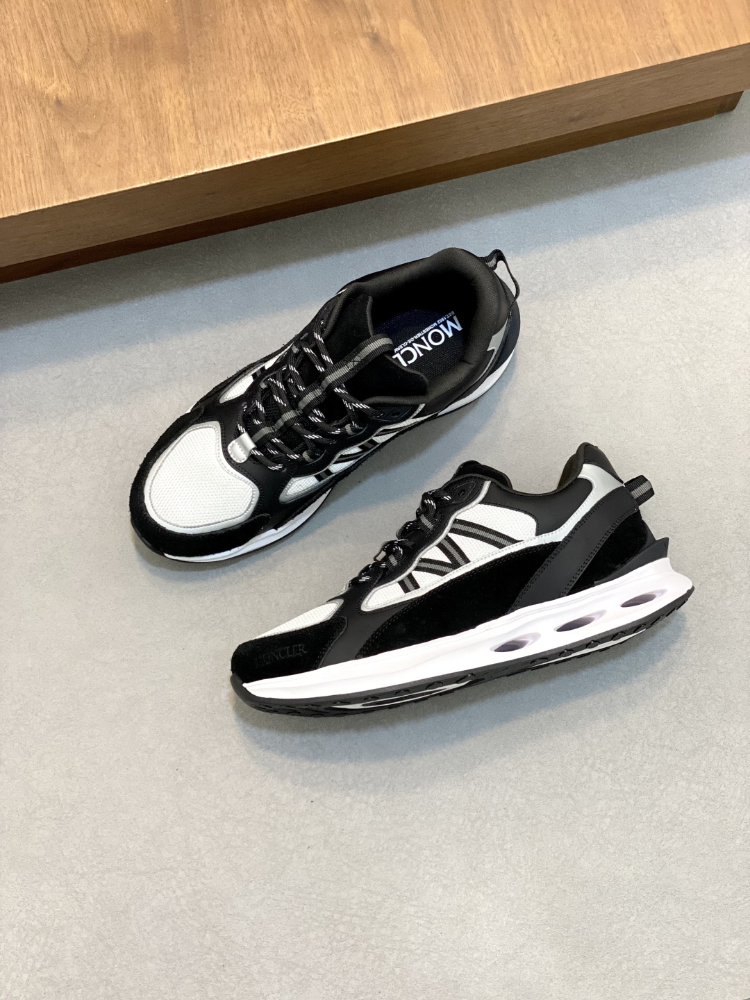 Moncler Men's Leather Sneakers with Rubber Detailing in Black and White 6 cmp i1744042410932 2541 0 4