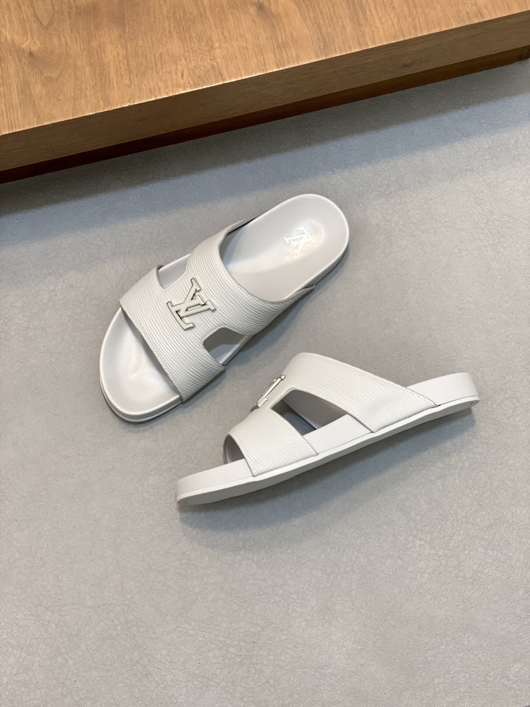 Louis Vuitton Monogram Embossed Rubber Slides Sandals for Women 3 cmp i1744910394571 1408 0 1
