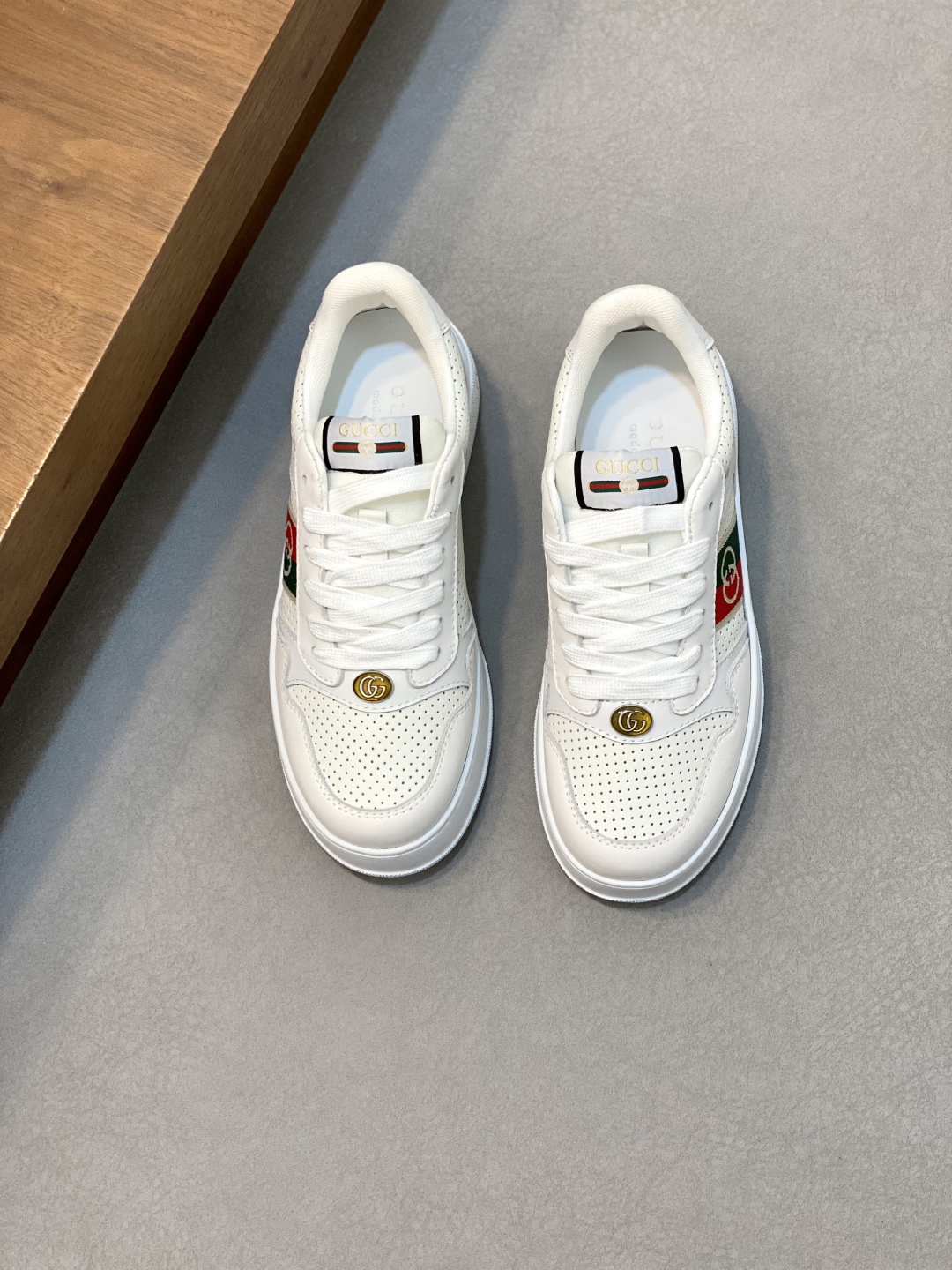 Gucci White Leather Sneakers with Embroidered Brand Logo and Perforated Toe 2 cmp i1745253982107 7290 0 0