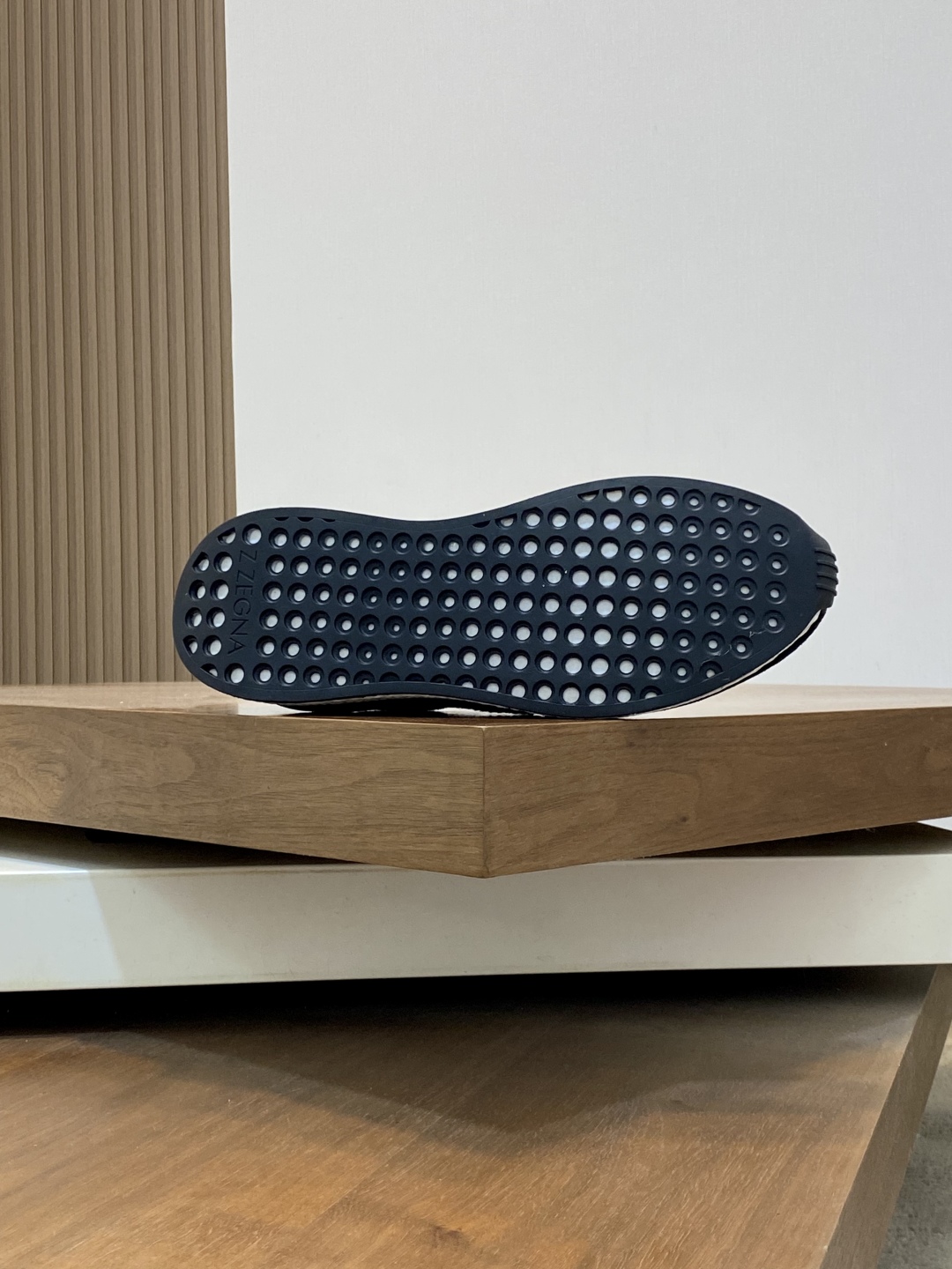 ZZegna/Zegna actualización única original Piuma en italiano se refiere a la "pluma", destacando plen