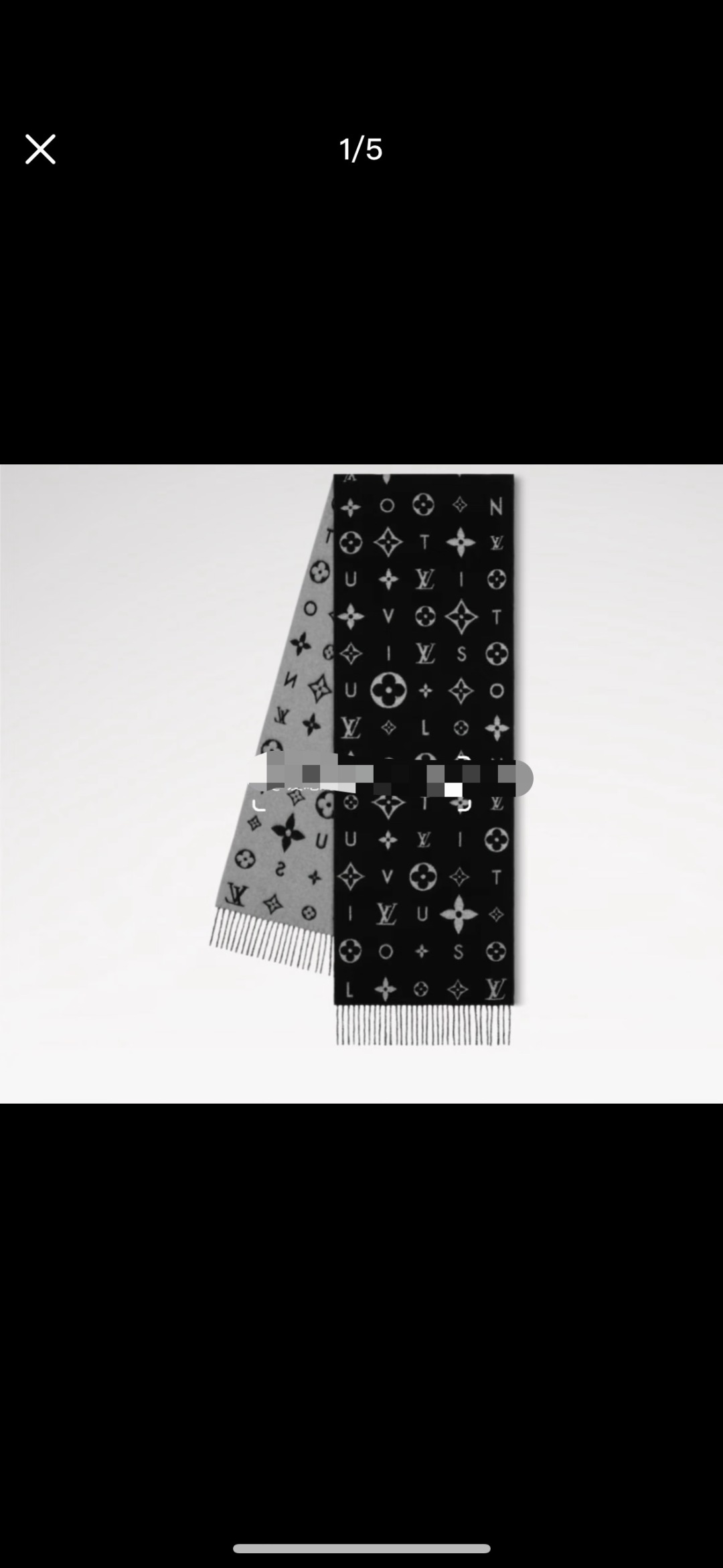 Reykjavik 2.0 围巾为柔软山羊绒标注 Monogram 花卉和 LV 字母，其间点缀品牌名称