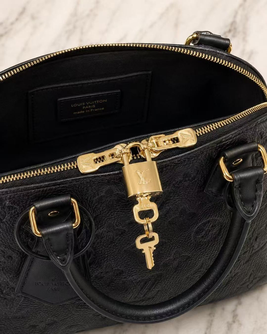 Louis Vuitton Alma BB Handbag