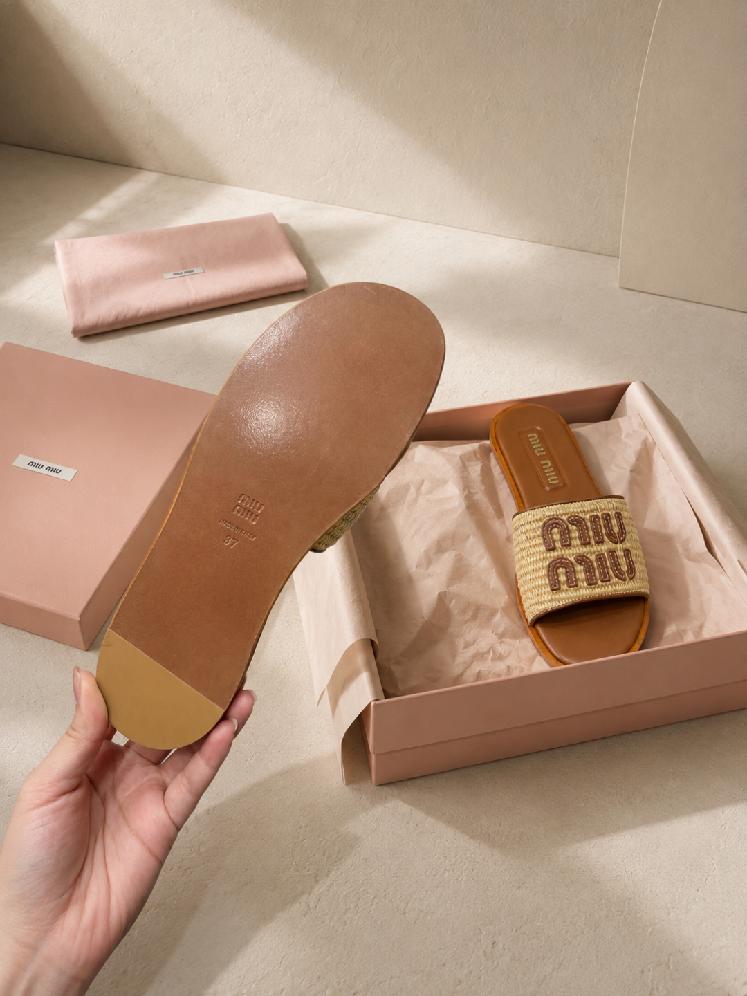 miu miu woven raffia logo slide sandals
