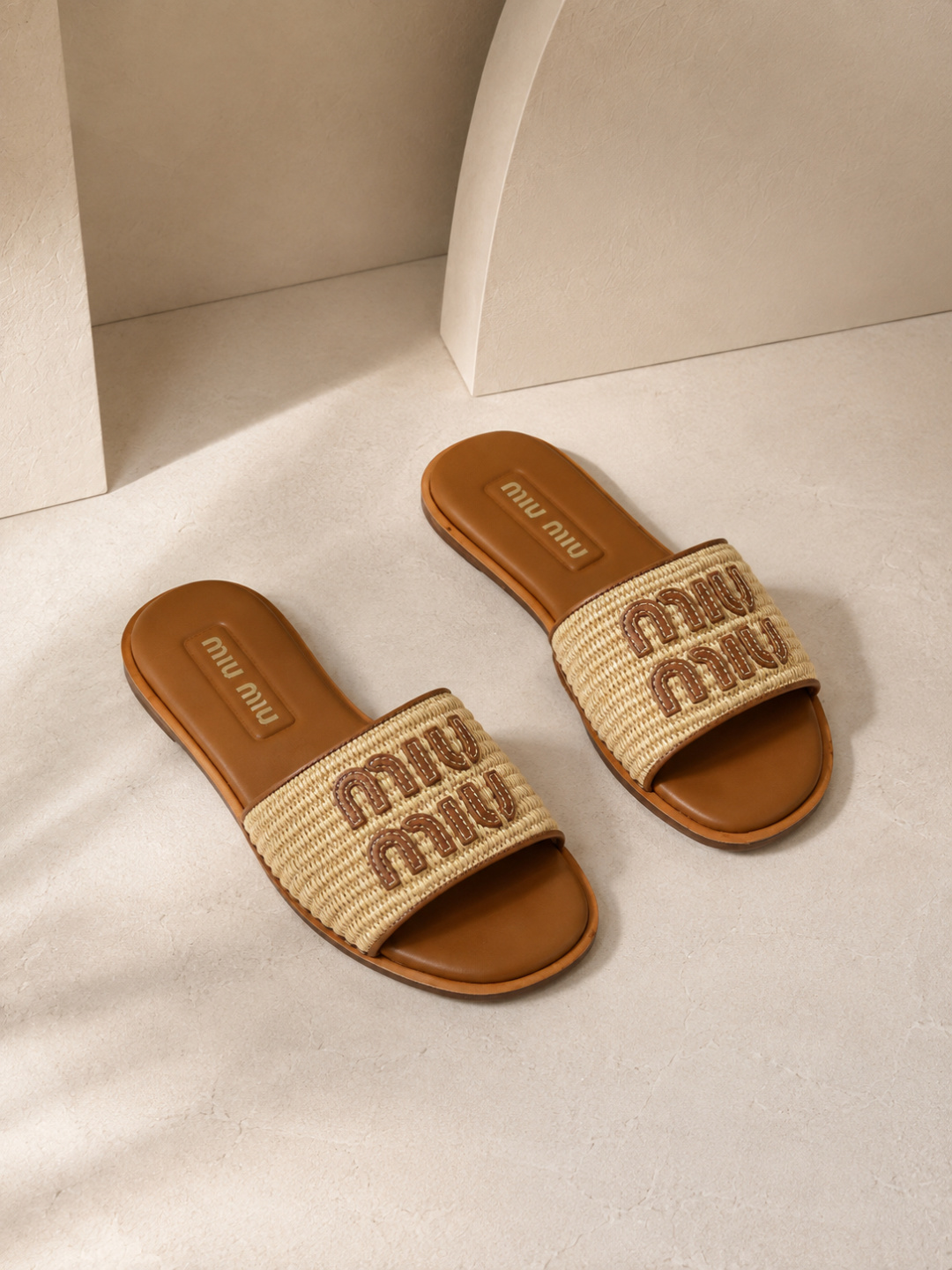miu miu woven raffia logo slide sandals