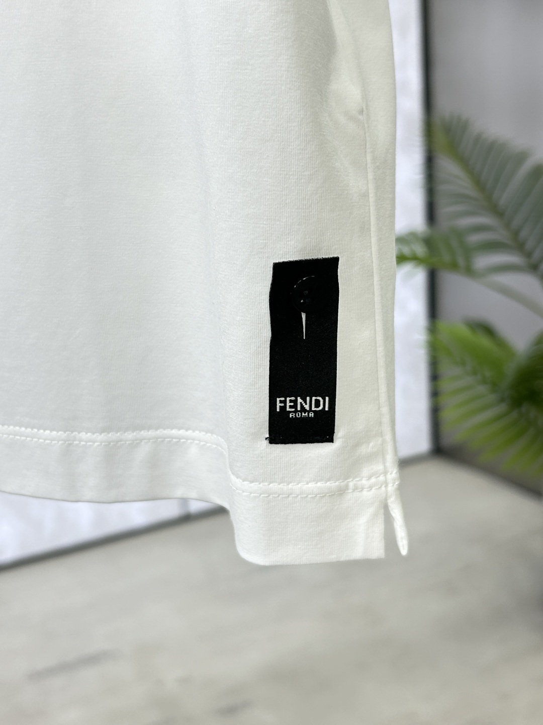 Fendi White Cotton Crew Neck T-Shirt with Metal Logo Detail 8 cmp i1742673323351 3319 0 6