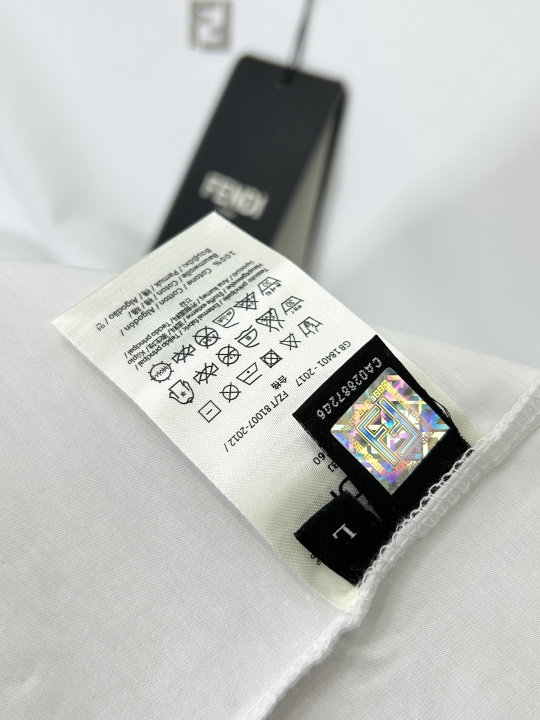 Fendi White Cotton Crew Neck T-Shirt with Metal Logo Detail 9 cmp i1742673323351 538 0 7