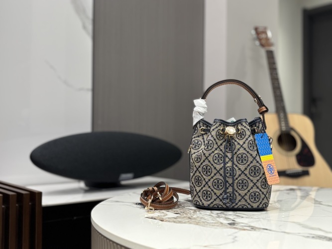 Tory Burch Floral Bucket Bag with Adjustable Handle and Removable Pouch 1 Tory Burch Floral Bucket Bag with Adjustable Handle and Removable Pouch