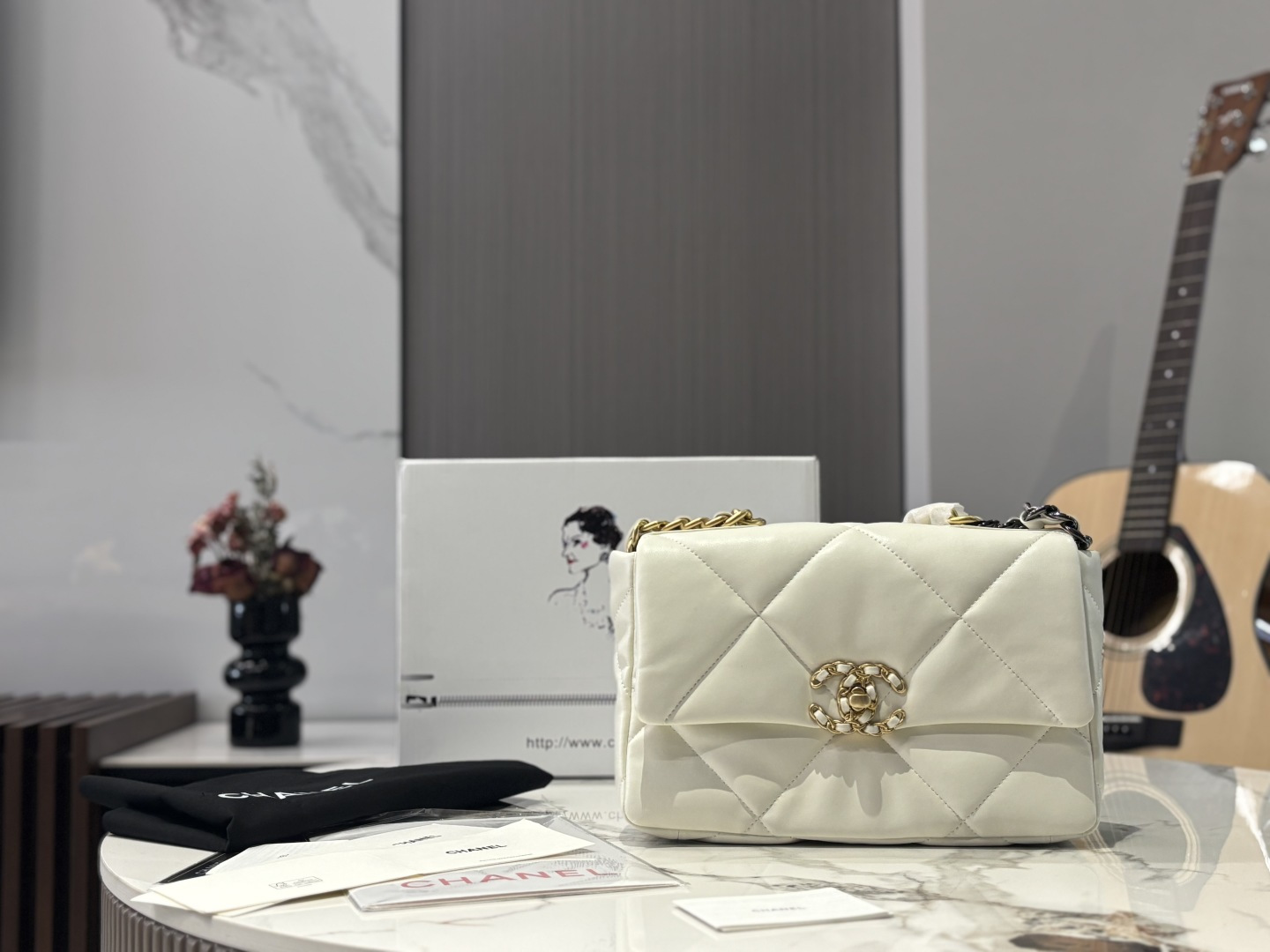 Chanel 19 Bag: Luxurious Quilted Leather Handbag with Chain Strap, 26x16cm