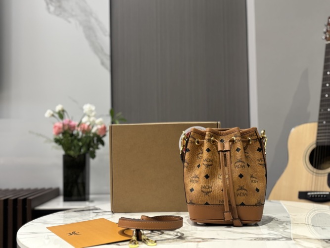 MCM Women's Mini Bucket Bag in Signature Visetos - Versatile Crossbody 1 MCM Women's Mini Bucket Bag in Signature Visetos - Versatile Crossbody