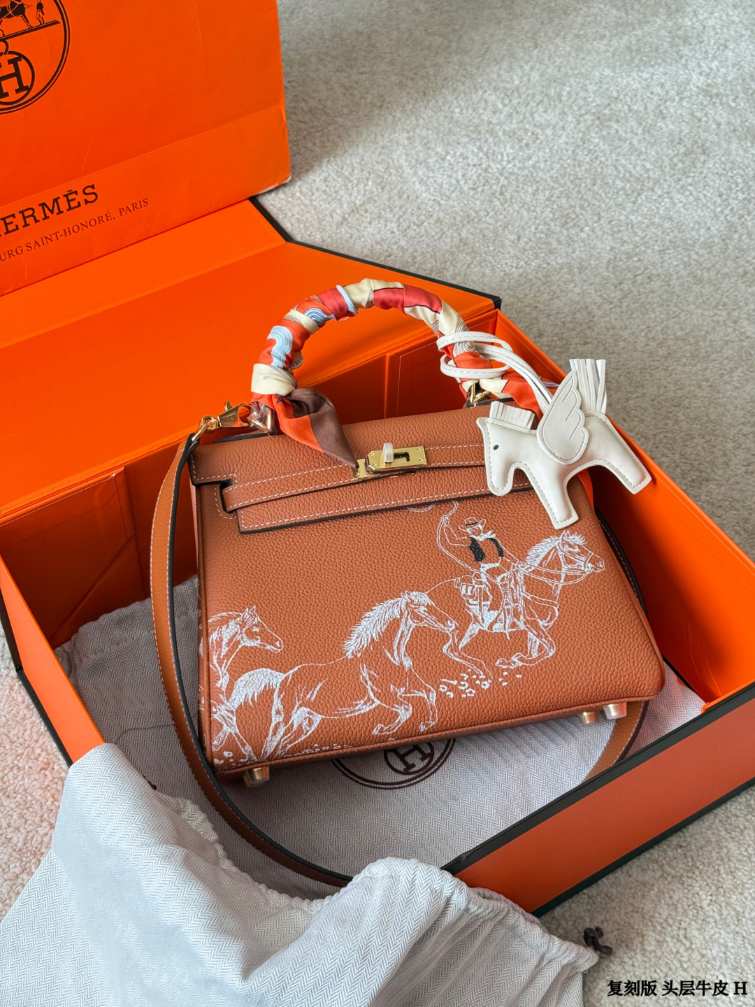 Hermes Kelly Brown leather with white horse print shoulder everyday