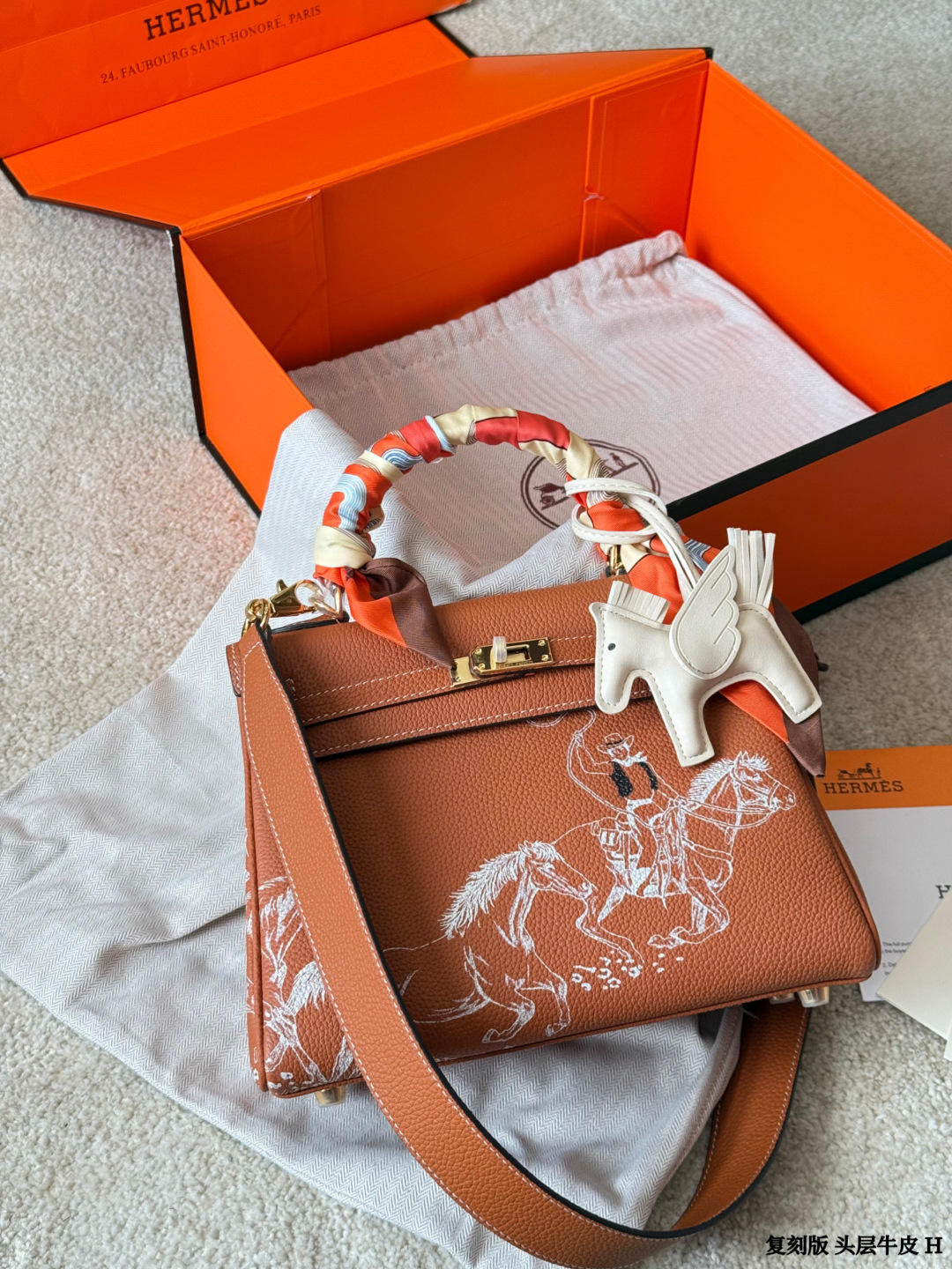 Hermes Kelly Brown leather with white horse print shoulder everyday