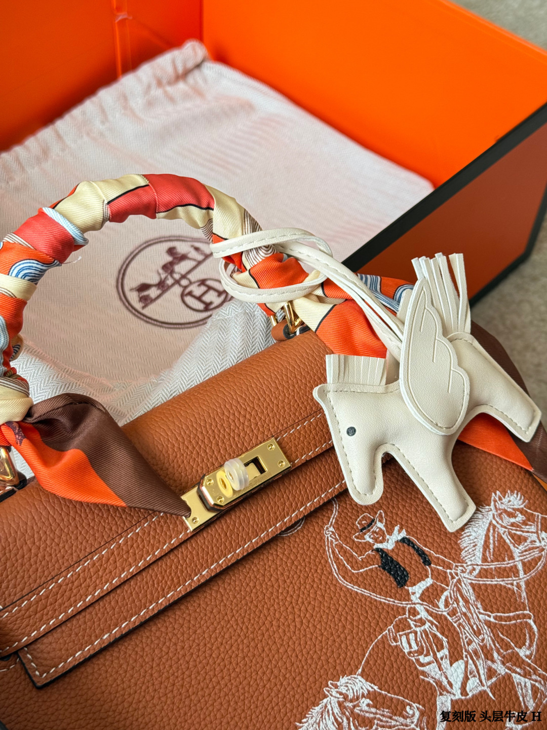 Hermes Kelly Brown leather with white horse print shoulder everyday