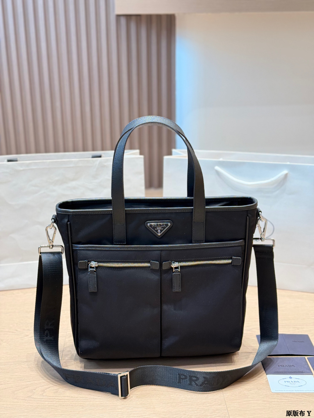Fabric P270 | Prada Nylon Shoulder Bag | Vprada's Nylon Shoulder Bag Is Made Of Classic Black Nylon + Leather Trim, Simple, Elegant And Durable The Double Zipper Pockets On The Front Are Super Practical And Can Easily Hold Notebooks, Documents And Other Items During Daily Commuting. The Shoulder Strap Is Adjustable, Supporting Various Carrying Methods Such As Hand-held, One-shoulder And Cross-body, Making It Flexible And Versatile. The Nylon Material Is Lightweight And Waterproof, Making Daily Care Easy. It Is A Must-have Item That Is Both Functional And Fashionable | Size 32 33cm