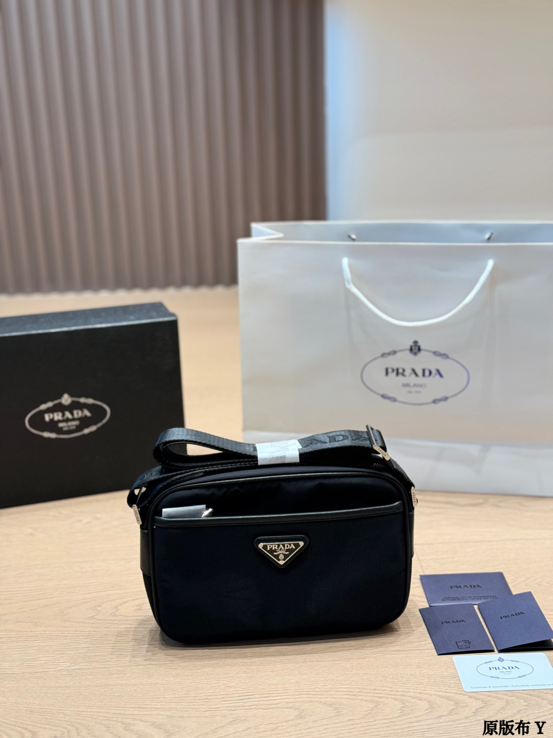 Cloth P203 | Prada Nylon Camera Bag | Prada Nylon Camera Bag, Classic Black Nylon + Leather Shoulder Strap, Simple And Practical The Triangular Metal Logo On The Front Is Very Recognizable. The Capacity Is Moderate, Making It Suitable For Commuting, Traveling, And Daily Outings. The Nylon Material Is Lightweight And Waterproof, The Shoulder Strap Is Adjustable, And It Can Be Worn Cross-body Or Hand-held. It Is Retro Yet Modern, A Must-have For Fashionistas | Size 25 17cm