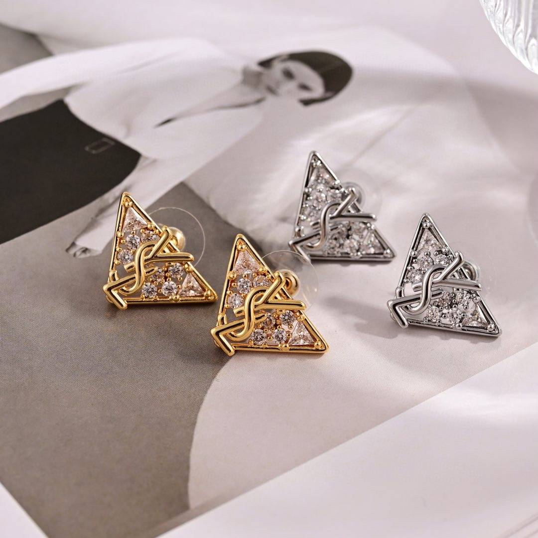 Saint Laurent YSL 1961 Triangle Monogram earrings Gold-tone metal with clear cubic zirconia Silver-tone metal with clear cubic zirconia 1 5cm stud length