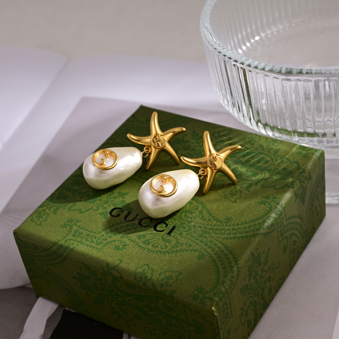 Elegantes Pendientes Gucci con Diseño de Estrella de Mar y Perla con Logo 6 cmp i1752242785762 730 0 4