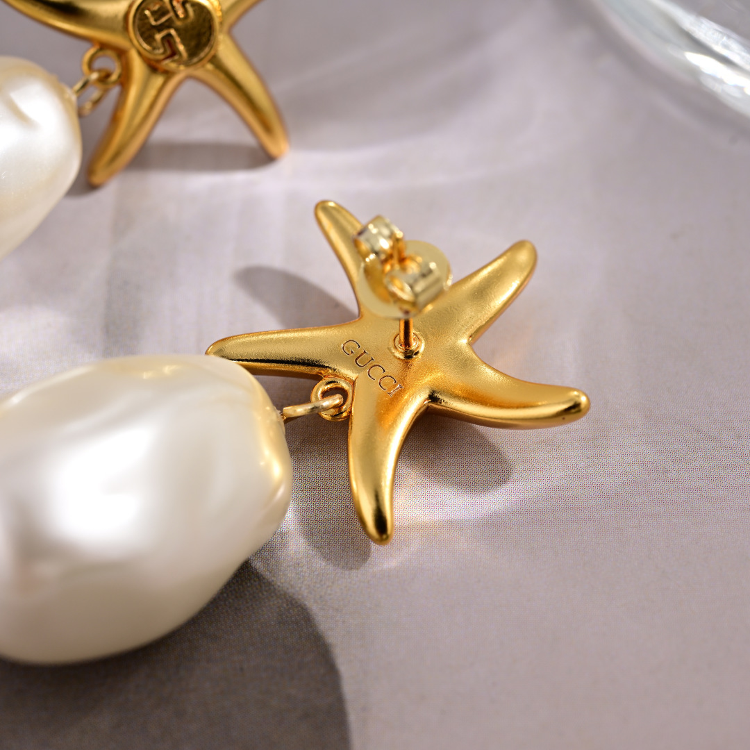 Elegantes Pendientes Gucci con Diseño de Estrella de Mar y Perla con Logo 8 cmp i1752242785762 7820 0 6
