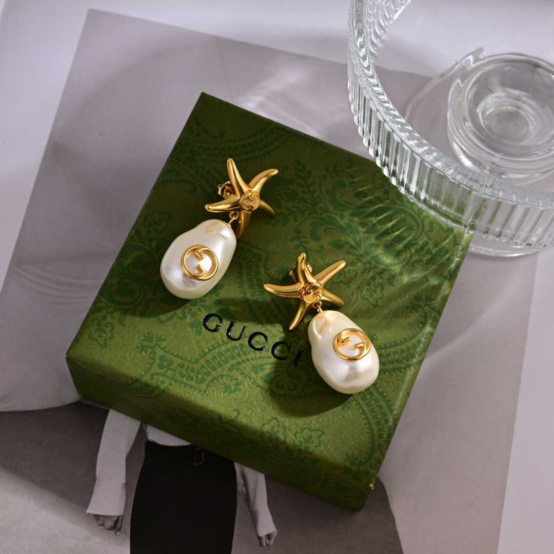 Elegantes Pendientes Gucci con Diseño de Estrella de Mar y Perla con Logo 5 cmp i1752242785766 7653 0 3