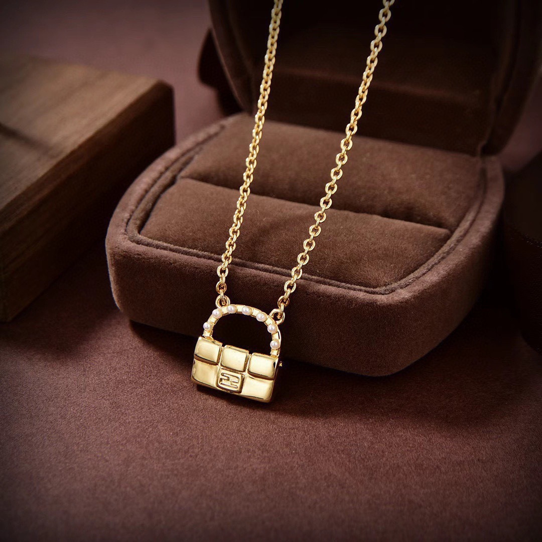 Fendi Baguette Bag Pendant Necklace necklace gold-tone metal with white pearl accents 45cm with 5cm extender