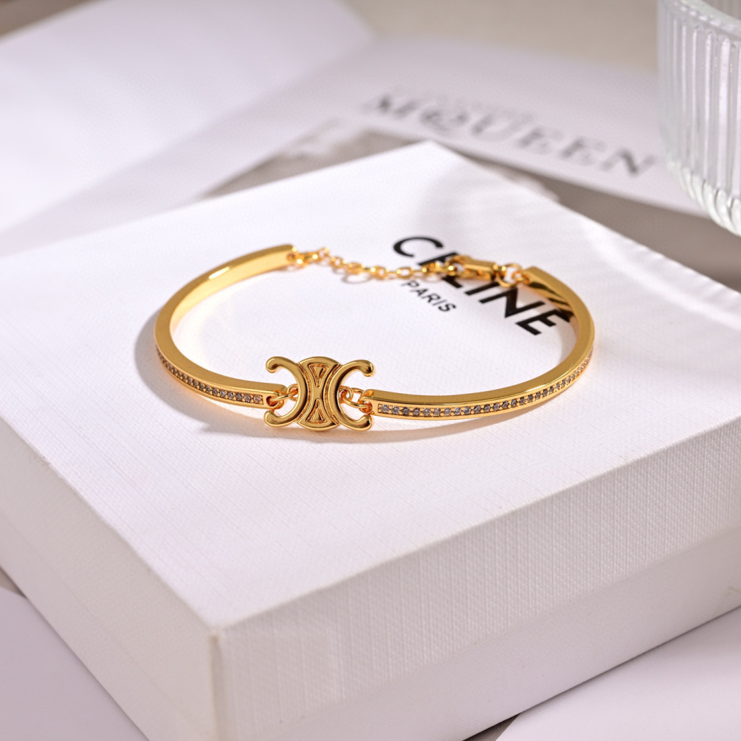 Celine Triomphe Sparkle bracelet gold-tone brass with clear crystal accents adjustable 16-19cm