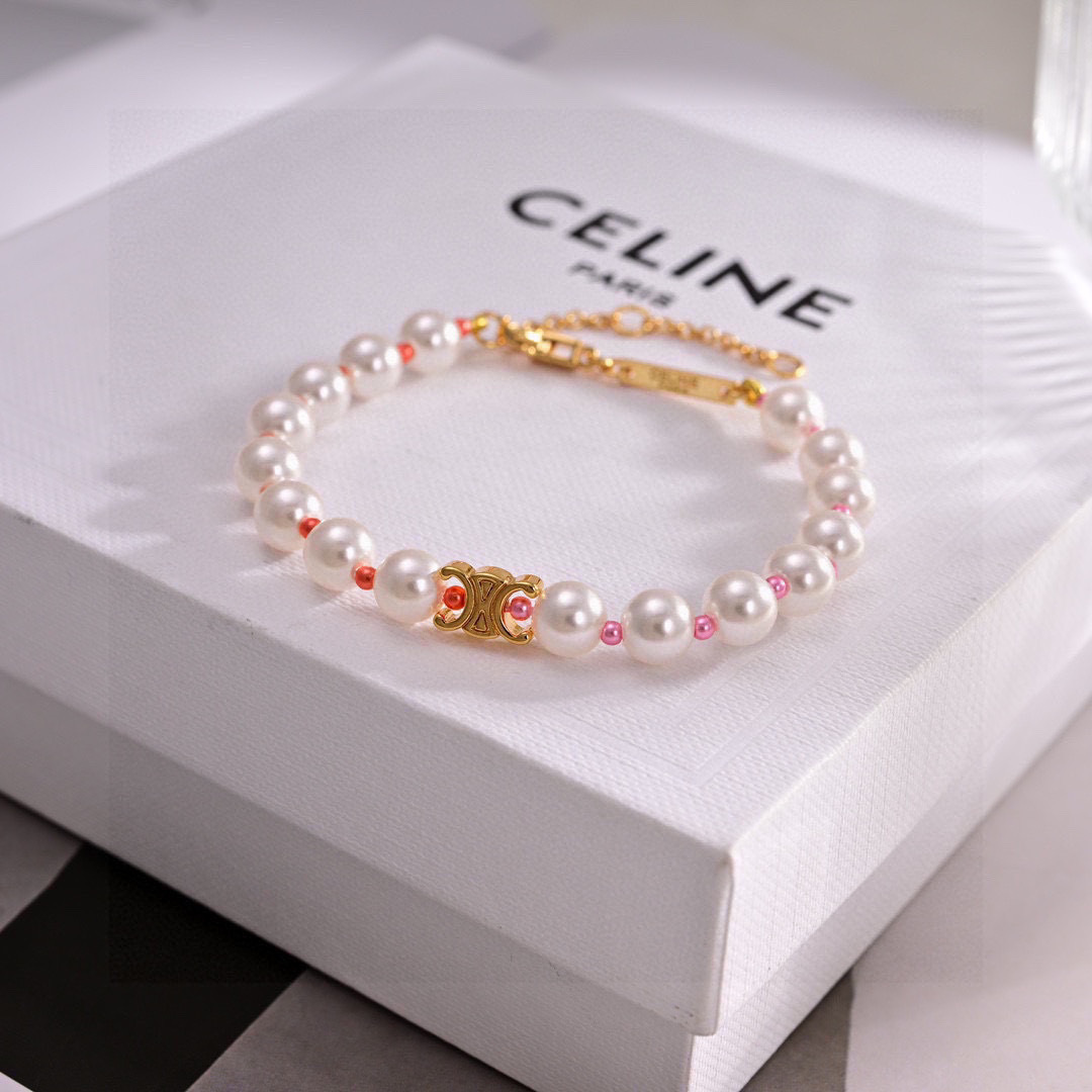 Celine Triomphe Pearl bracelet gold-tone metal white pearls pink and coral accent beads 18cm with 5cm extension chain