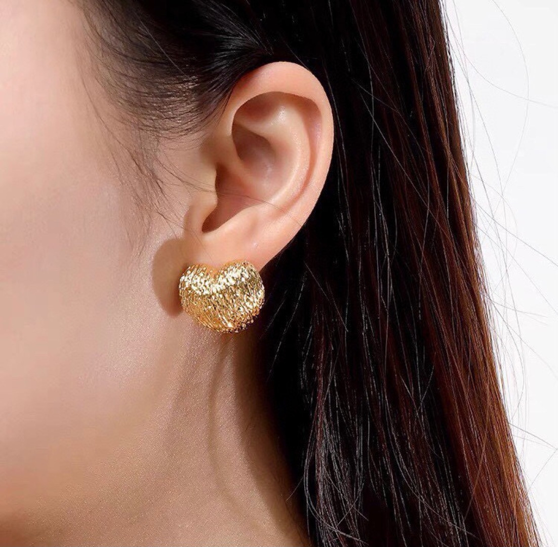 Celine Textured Puffy Heart Stud Earrings earrings Gold-tone metal with textured hammered finish no accent stones 1 5cm stud diameter