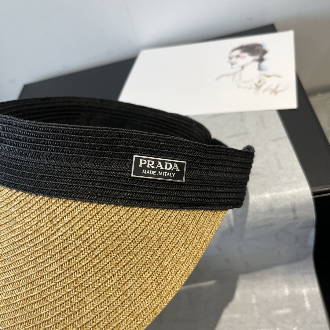 P

Prada普拉达新款纸草空顶遮阳帽