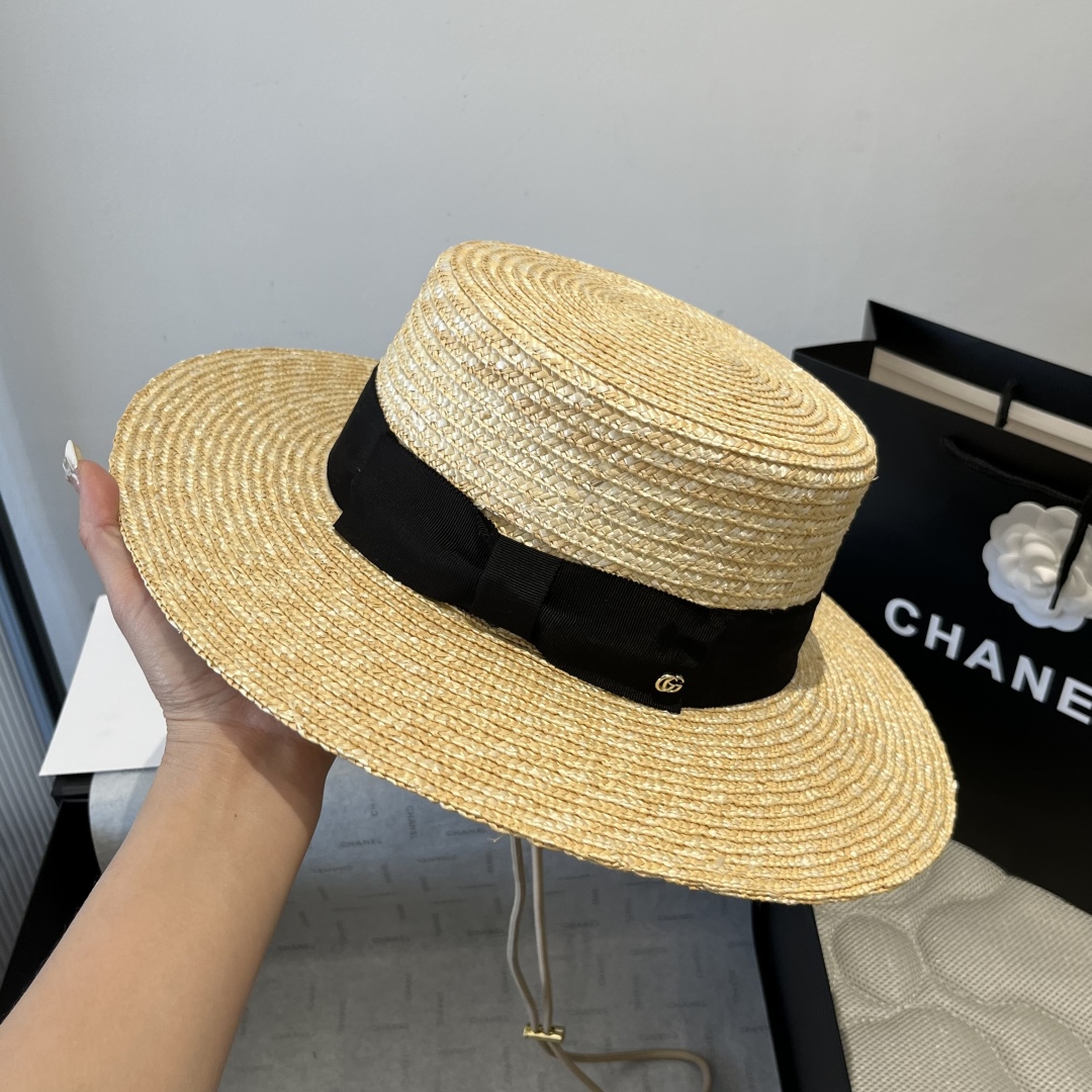 P

Gucci古奇平顶麦秆草礼帽。高级定制
