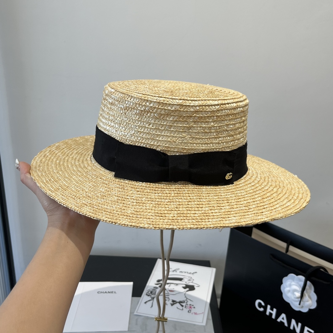 P

Gucci古奇平顶麦秆草礼帽。高级定制