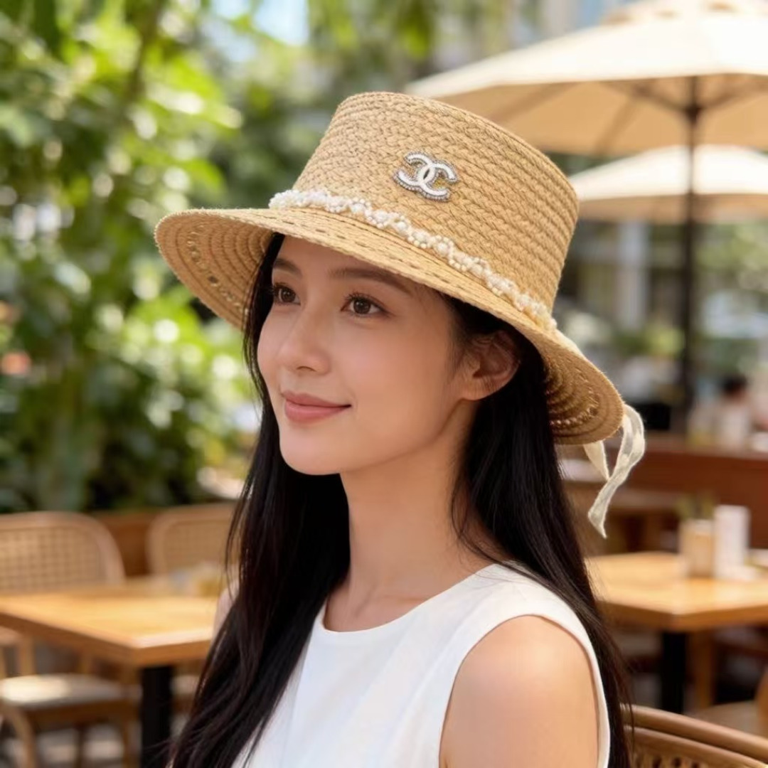 Chanel Chanel香奈儿新款蝴蝶结拉菲草帽，旅游 ，头围57cm