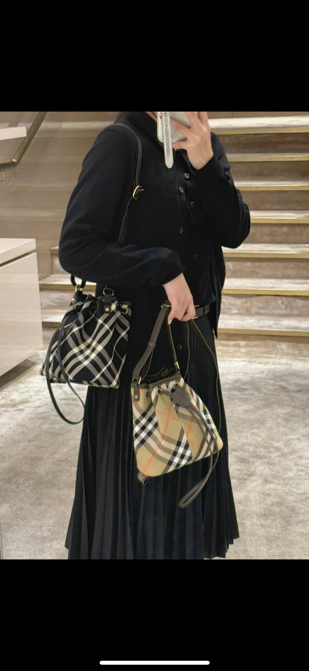 Burberry The plaid bucket bag is so pretty
