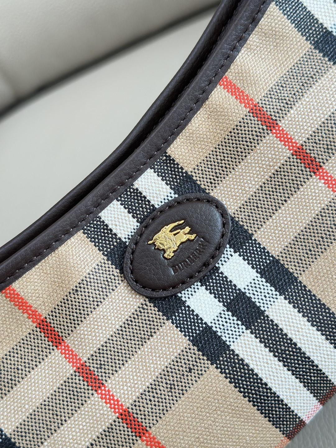 Burberry's new shoulder bag is designed with outdoor design concepts in mind. Crafted in an Italian workshop from a cotton and linen blend, it's
