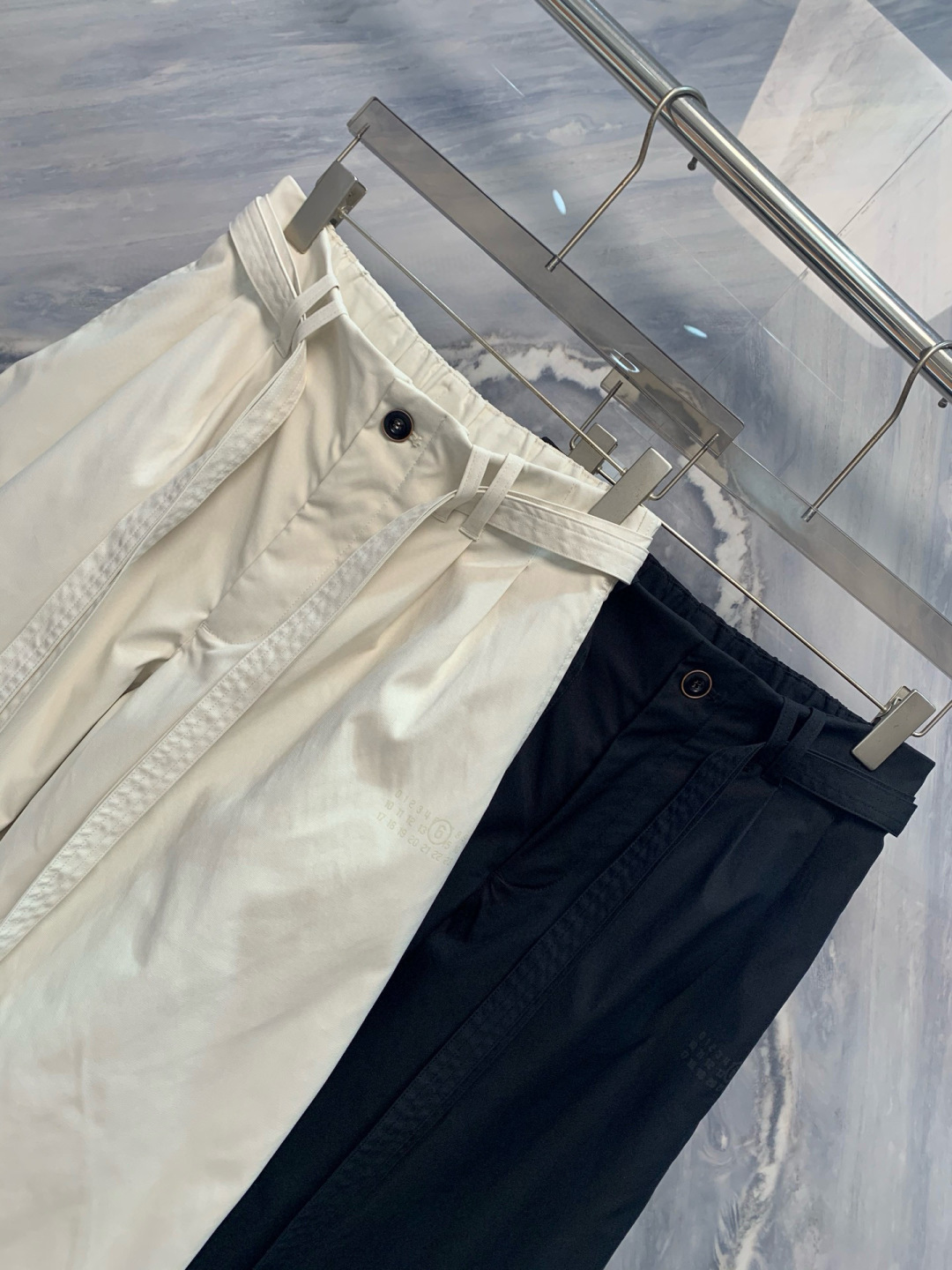 介绍一下这一款OU柜台限定发售男士户外运动防风防雨抽绳运动机能长裤的细节，标题，文案，要求介绍的特别高级