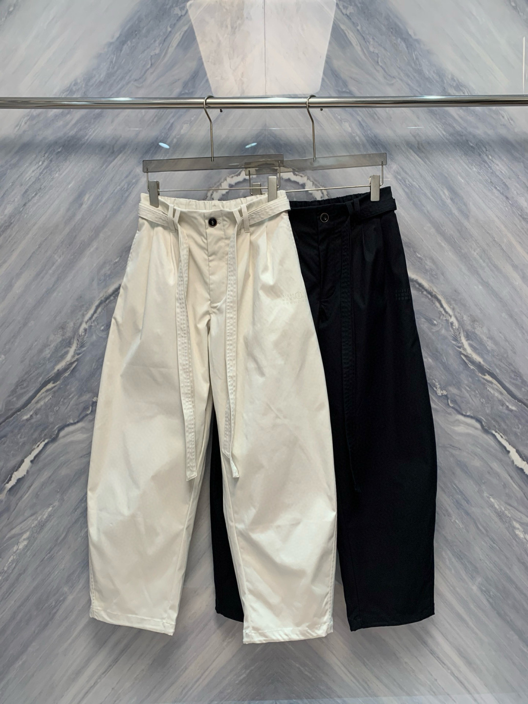 介绍一下这一款OU柜台限定发售男士户外运动防风防雨抽绳运动机能长裤的细节，标题，文案，要求介绍的特别高级