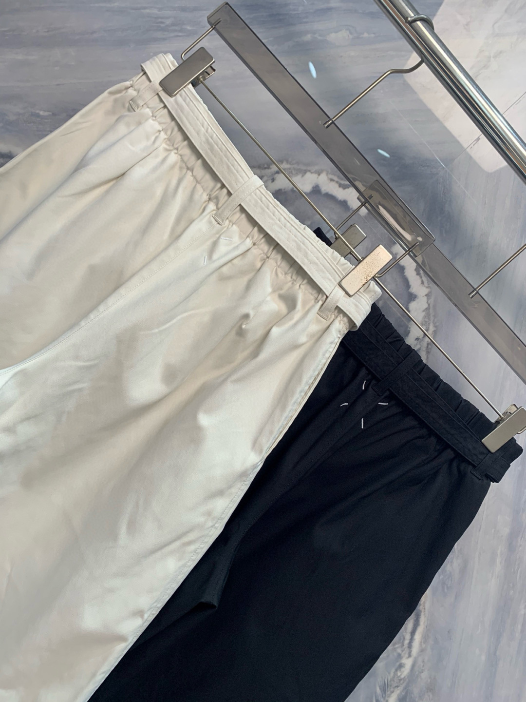 介绍一下这一款OU柜台限定发售男士户外运动防风防雨抽绳运动机能长裤的细节，标题，文案，要求介绍的特别高级