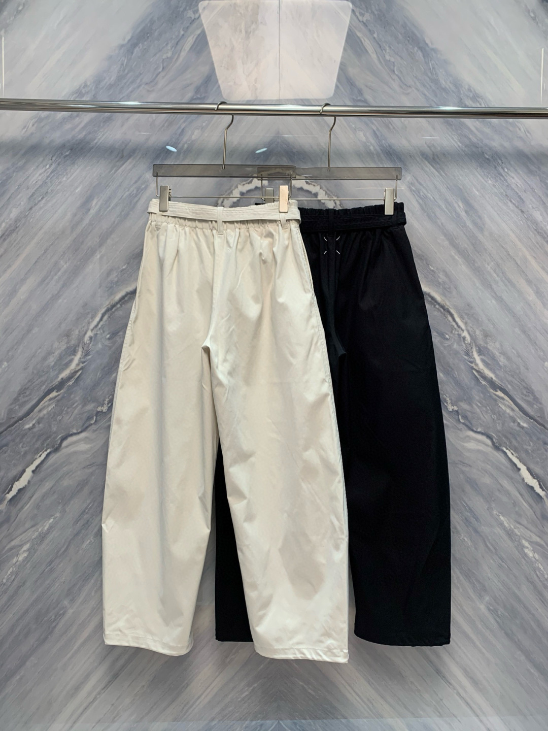 介绍一下这一款OU柜台限定发售男士户外运动防风防雨抽绳运动机能长裤的细节，标题，文案，要求介绍的特别高级